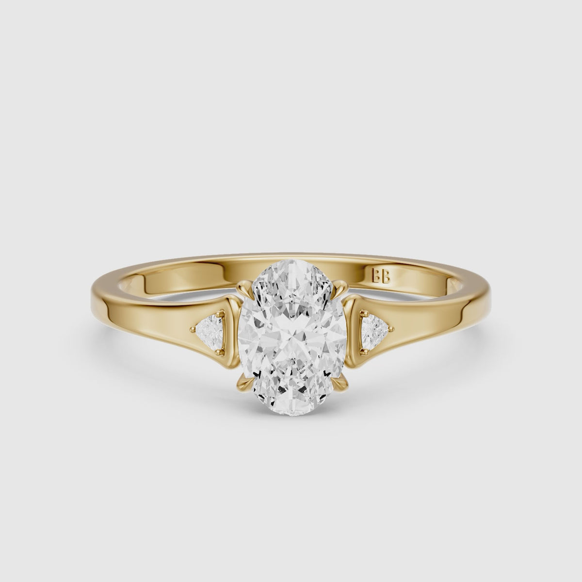 Load video: Maelle Oval Lab Grown Diamond Ring with Trillion Side Stones