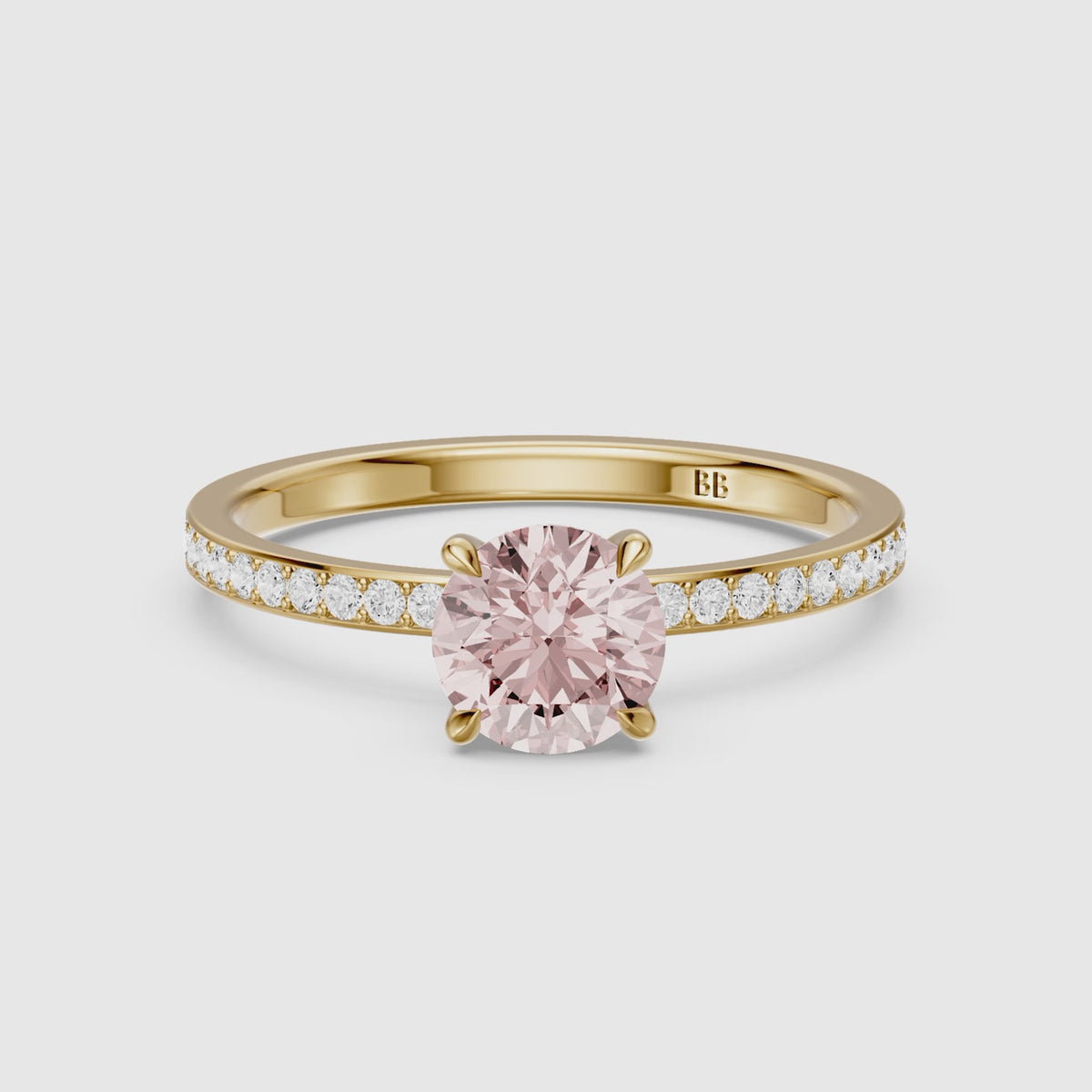Load video: Celandine Round Cut Hidden Halo Channel Set Pink Lab Grown Diamond Ring