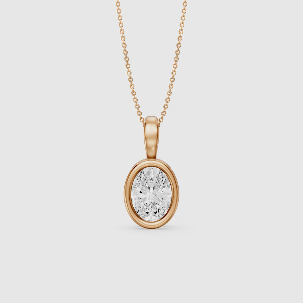 Load video: Bess Oval Shape Bezel Set Lab Grown Diamond Solitaire Pendant