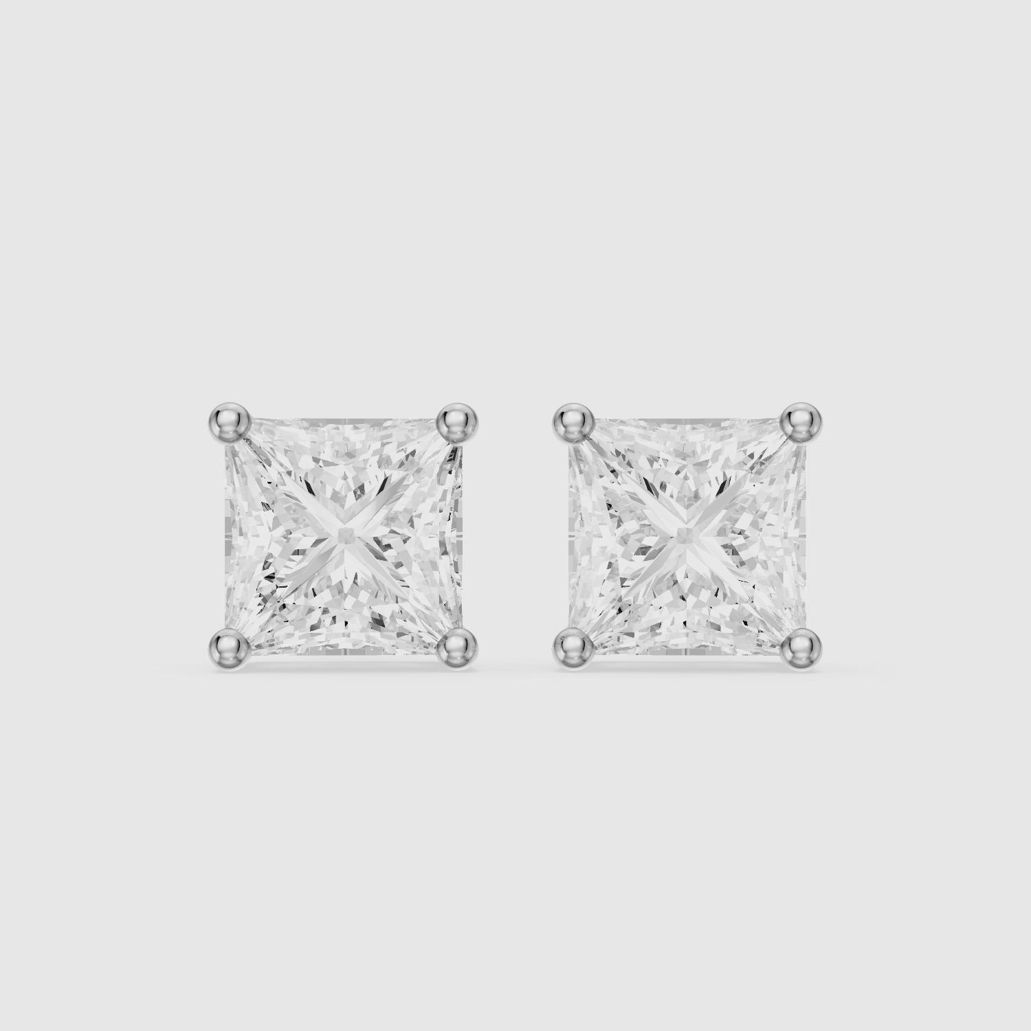 Load video: Leonora Princess Cut Lab Grown Diamond Solitaire Stud Earrings