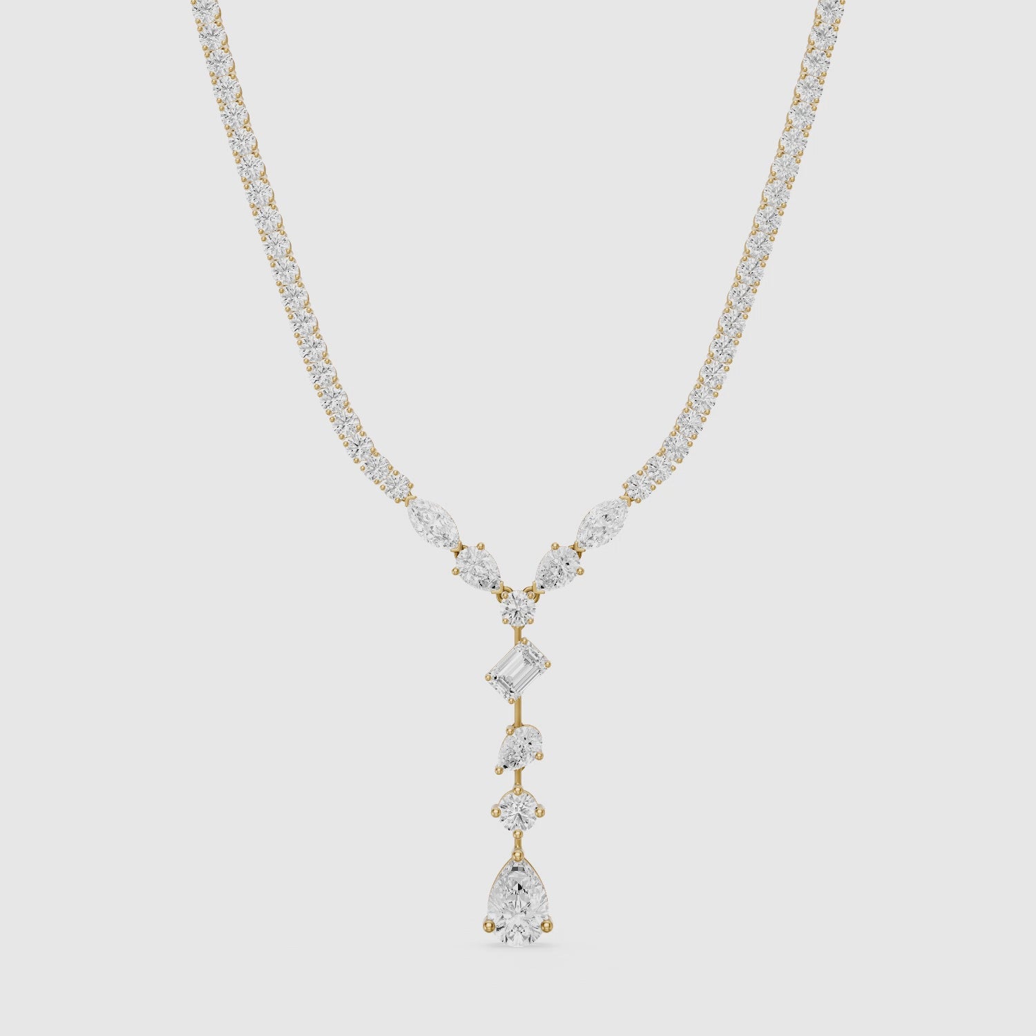 Load video: Yaretzi Pear and Emerald Cut Lab-Diamond Lariat Necklace