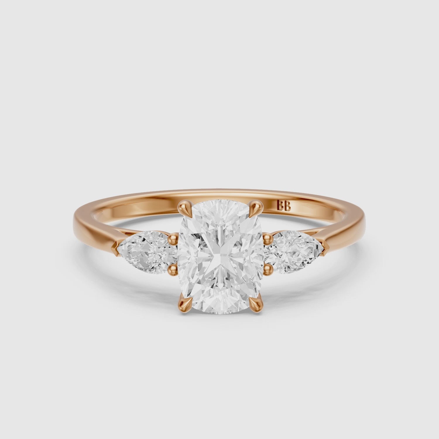 Load video: Nalani Three Stone Elongated Cushion Cut Lab Grown Diamond Ring with Pear Side Stones