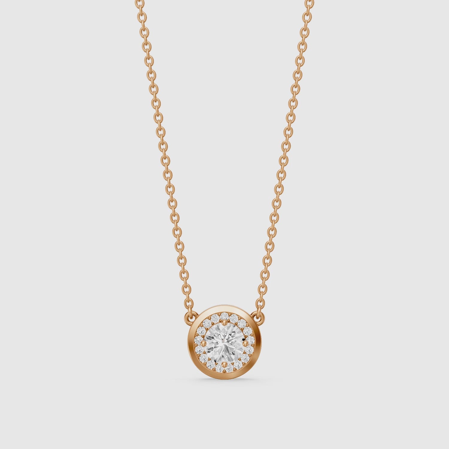 Load video: Marcella Bezel Set Round Lab Grown Diamond Halo Pendant