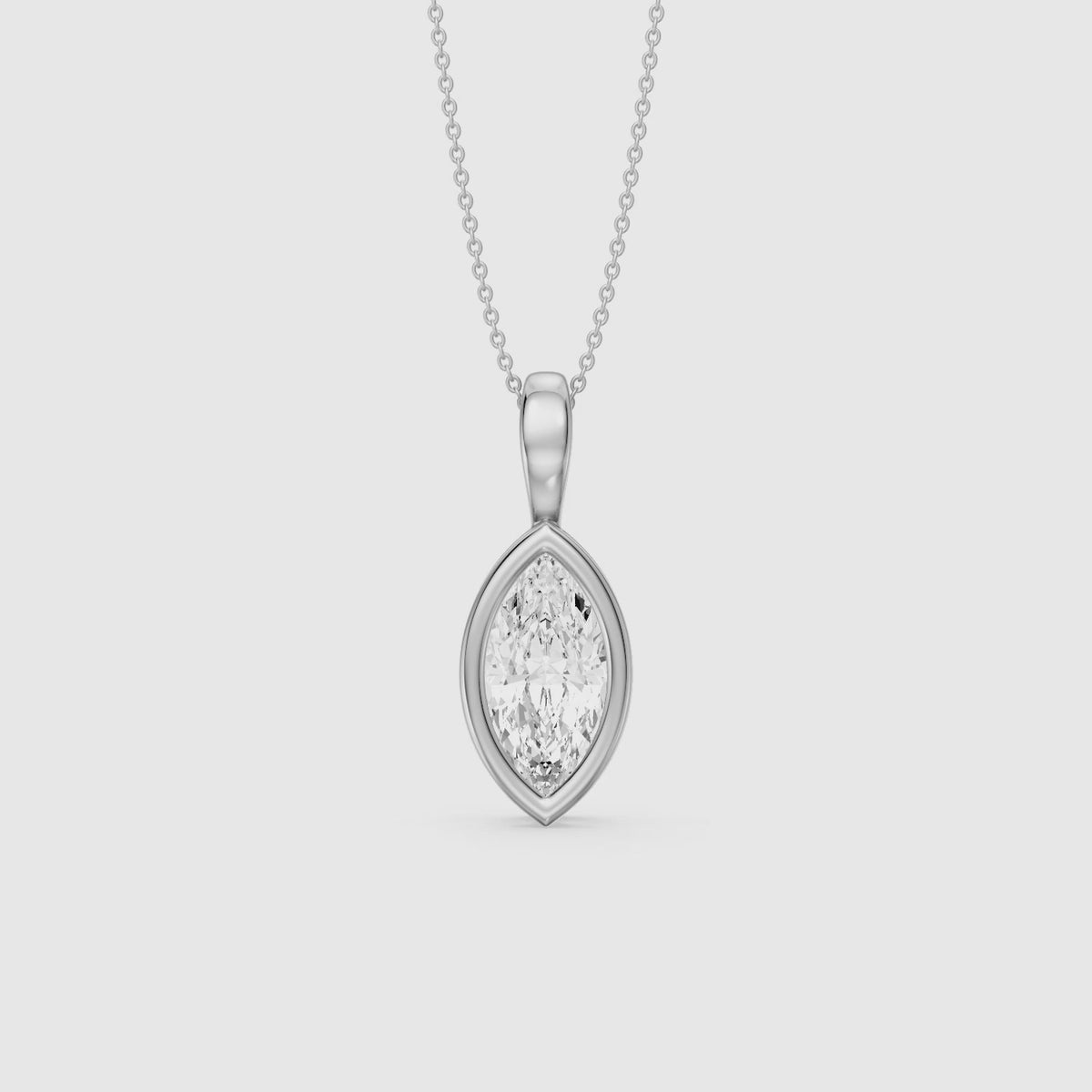 Load video: Diora Marquise Bezel Set Lab Grown Diamond Solitaire Pendant