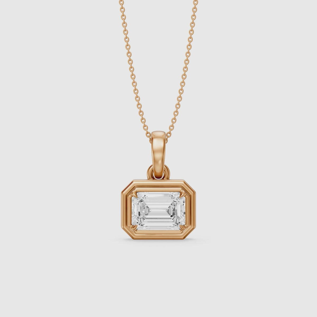 Load video: Leighton Emerald Cut Lab Grown Diamond East West Bezel Pendant