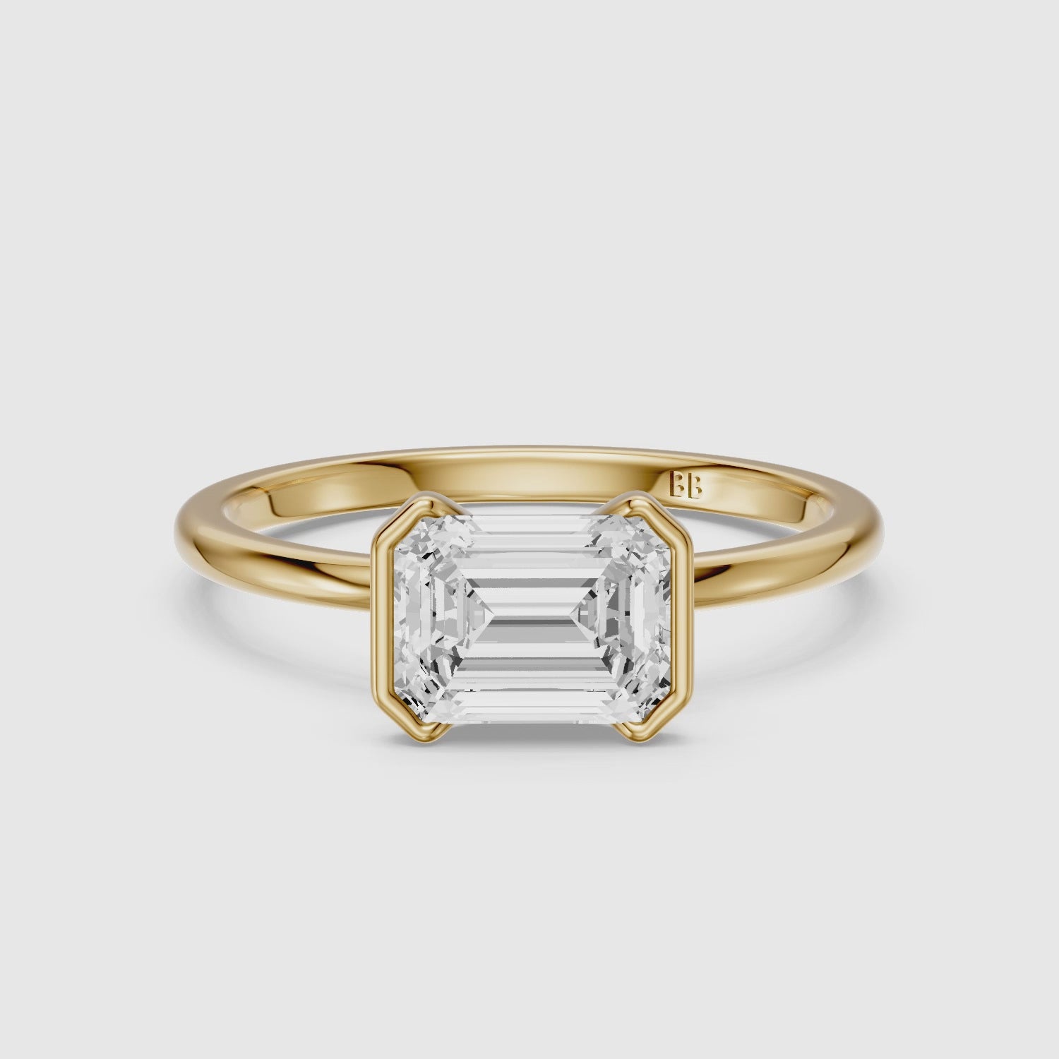 Load video: Kierra Emerald Half Bezel East West Lab Grown Diamond Ring