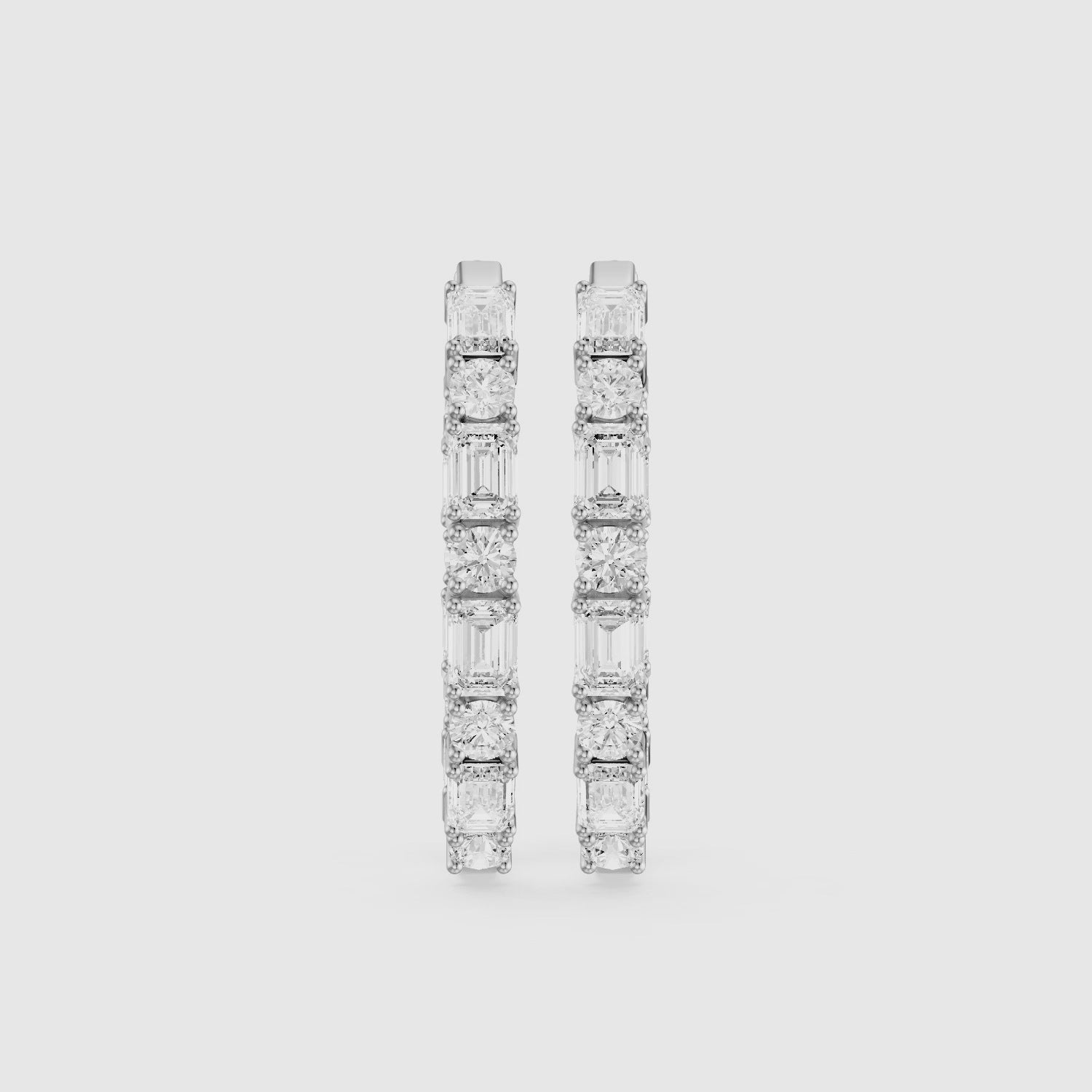 Load video: Kleio Emerald Cut and Round Cut Diamond Inside Out Hoop Earrings