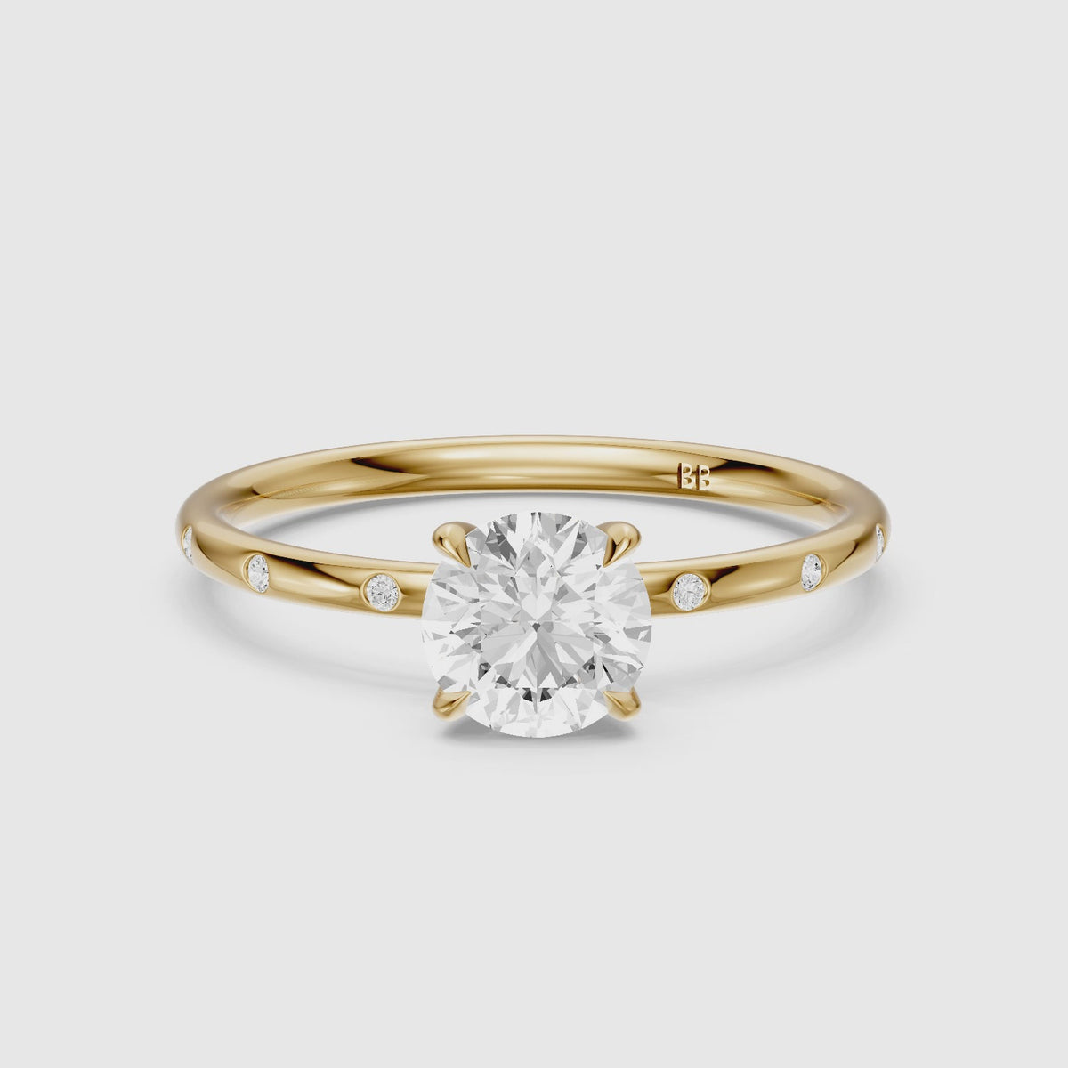 Load video: Calia Round Solitaire Lab Grown Diamond Engagement Ring with Flush Band