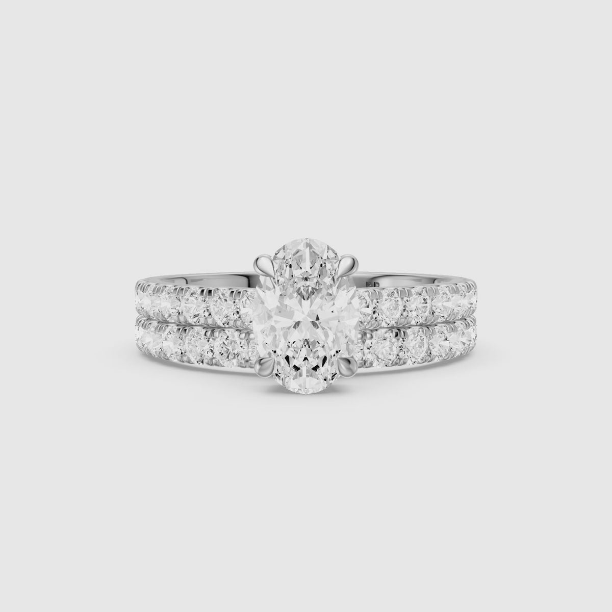 Load video: Zella Oval Cut Lab Grown Diamond Hidden Halo Pave Bridal Set