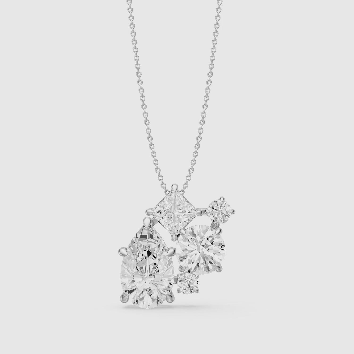 Load video: Mia Pear, Princess and Round Lab Grown Diamond Cluster Pendant