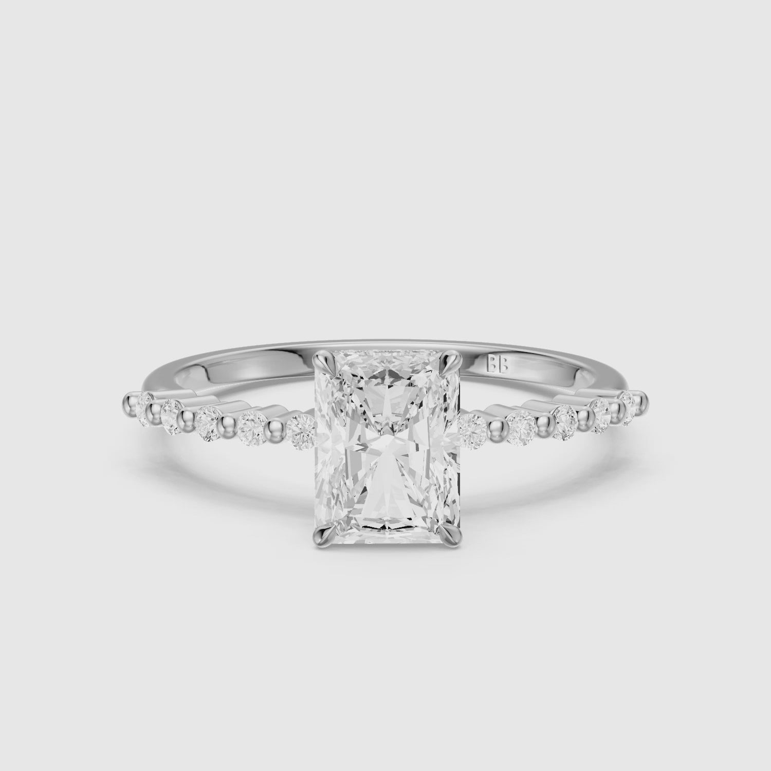Load video: Felina Radiant Cut Hidden Halo Side Stone Moissanite Diamond Ring