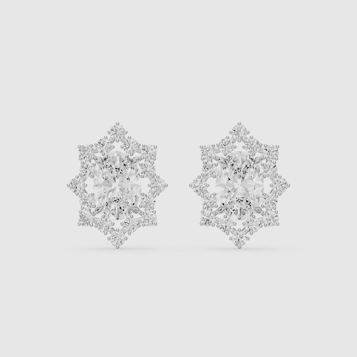 Load video: Vianne Oval Cut Lab Grown Diamond Star Halo Stud Earrings