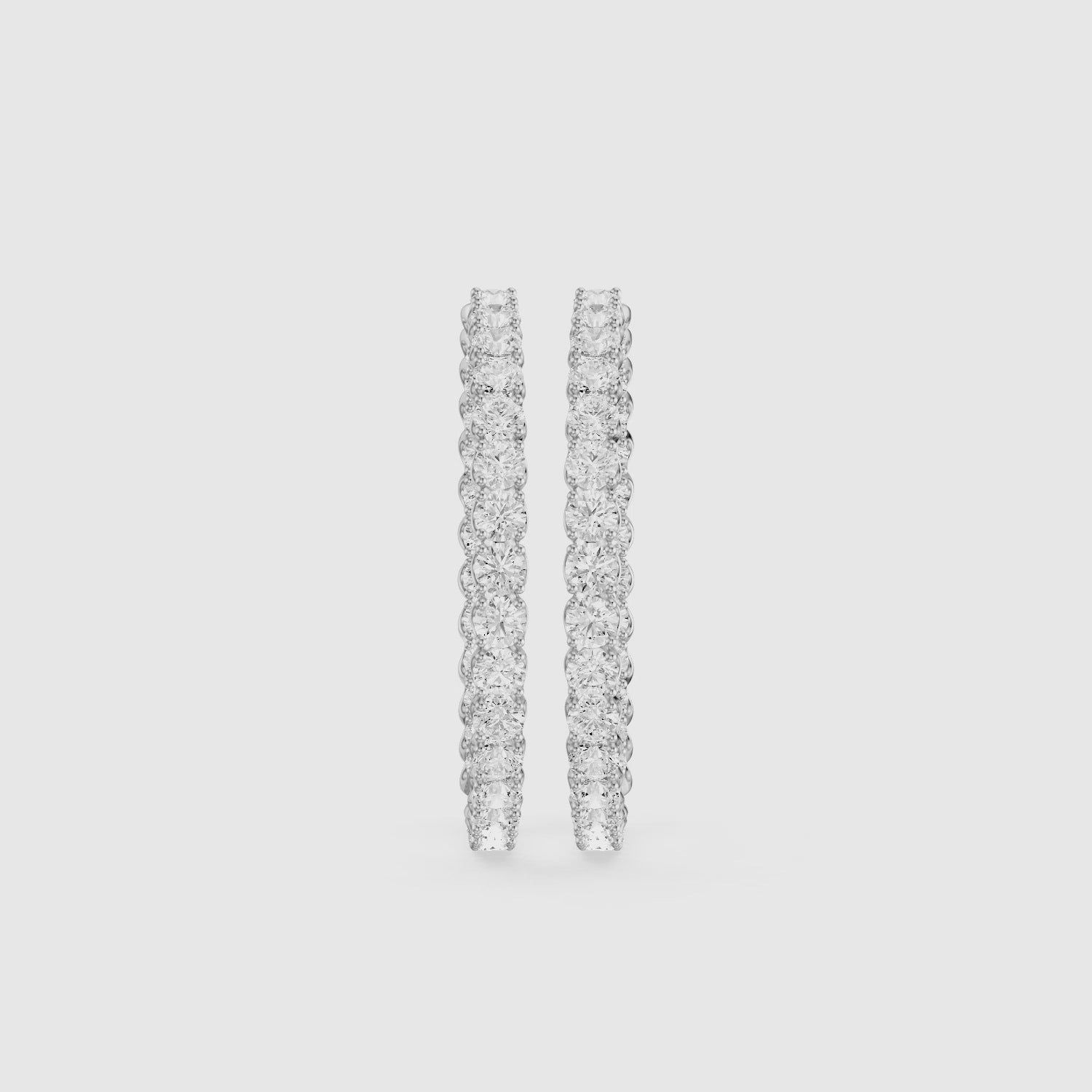 Load video: Solange Four Prong Round Lab Grown Diamond Inside Out Hoop Earrings