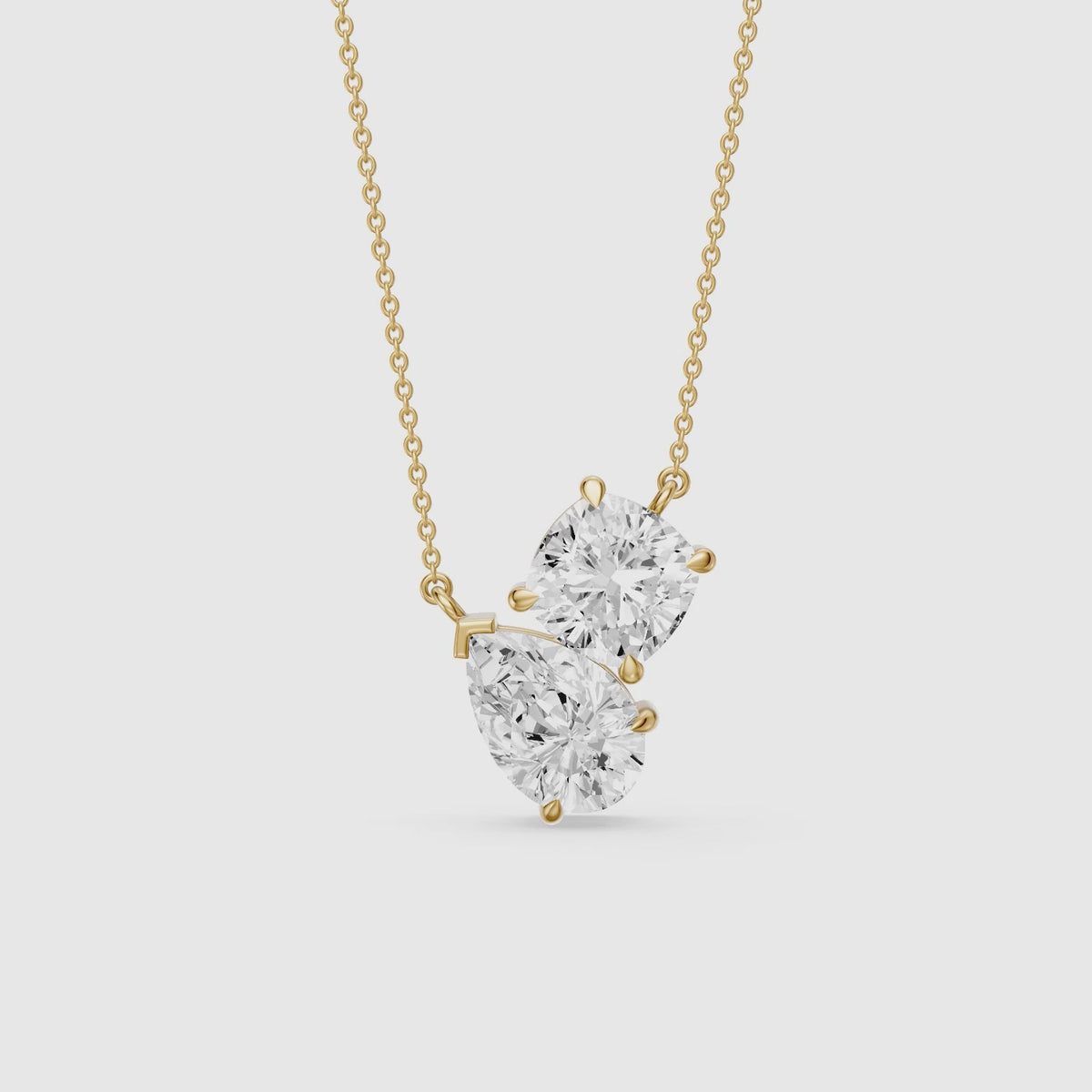Load video: Kendall Pear and Round Lab Grown Diamond Toi Et Moi Pendant