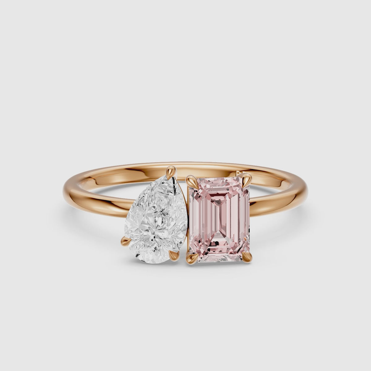 Load video: Kiara Pink Emerald Cut and Pear Shape Color Lab Grown Diamond Toi et Moi Ring