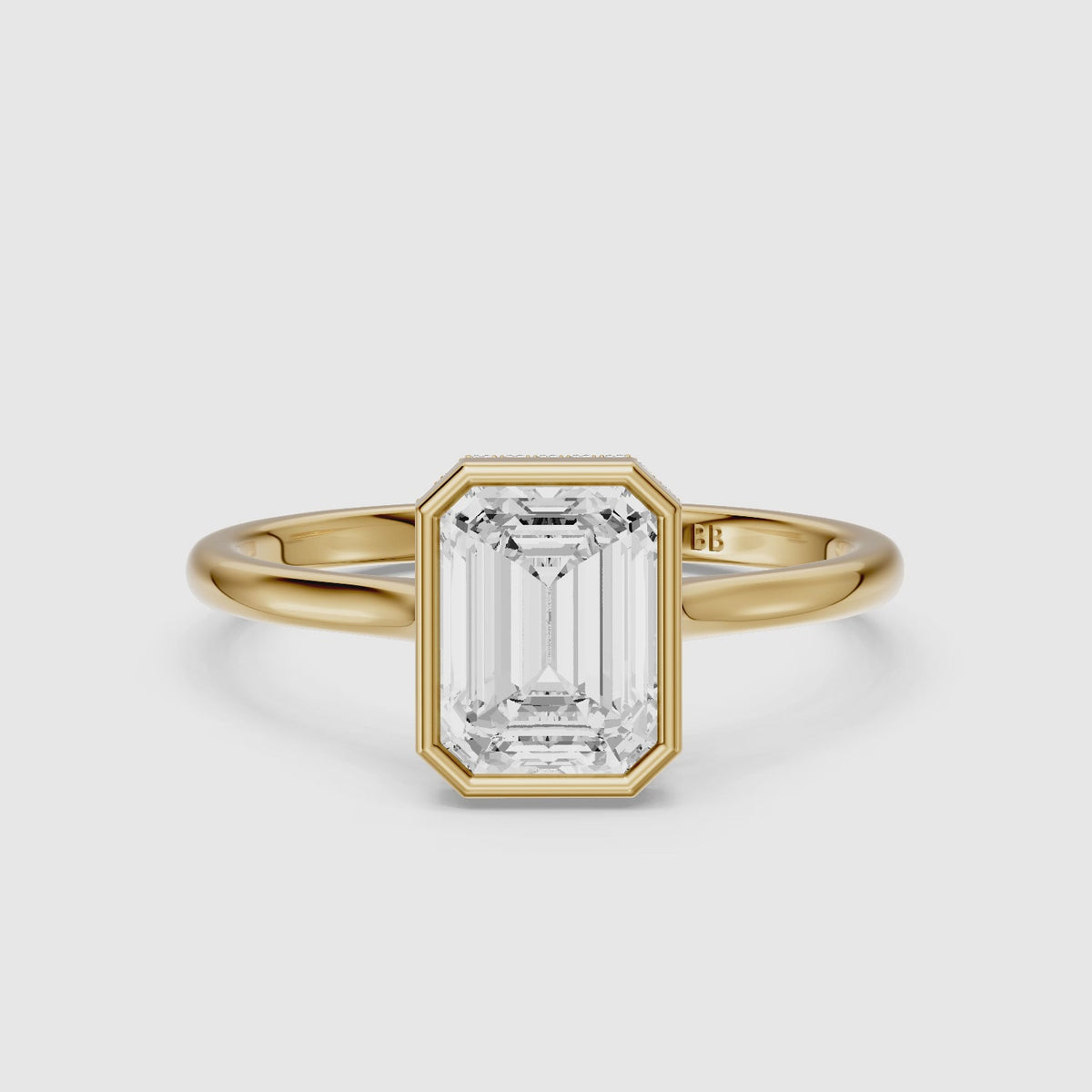 Load video: Anouk Emerald Cut Bezel Lab Grown Diamond Engagement Ring with Hidden Halo