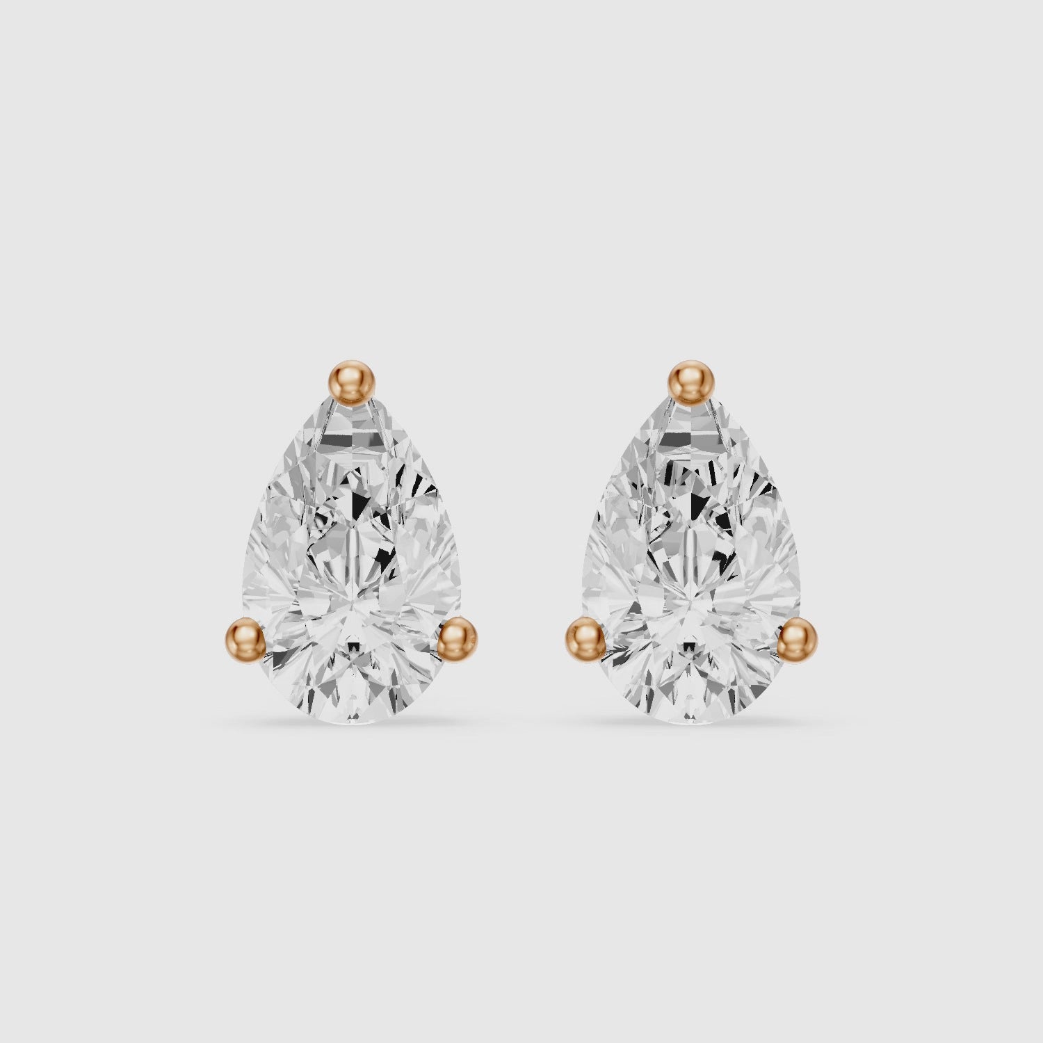 Load video: Eirlys Pear Cut Lab Grown Diamond Teardrop Solitaire Earrings