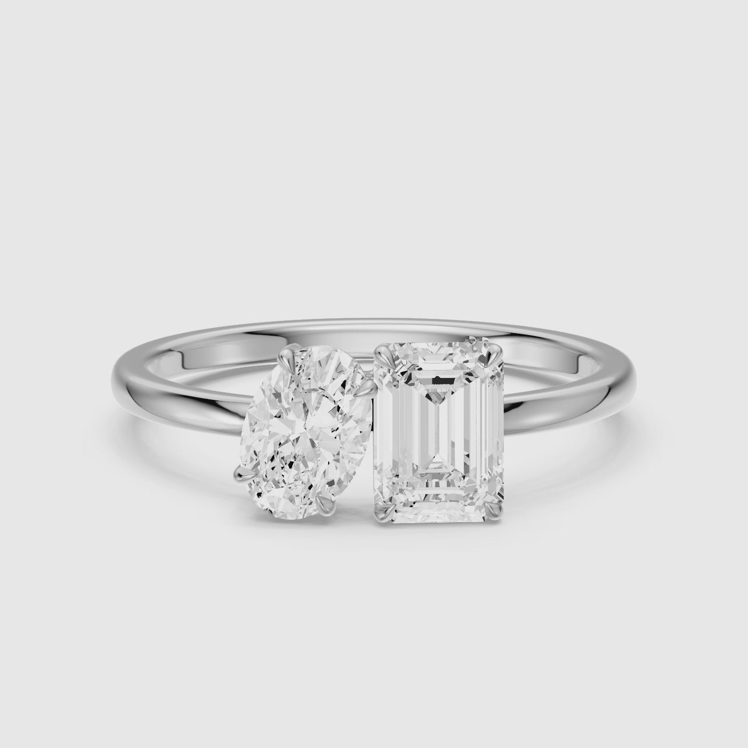 Load video: Celina Toi Et Moi Engagement Ring With Oval and Emerald Two Stone Lab Grown Diamond