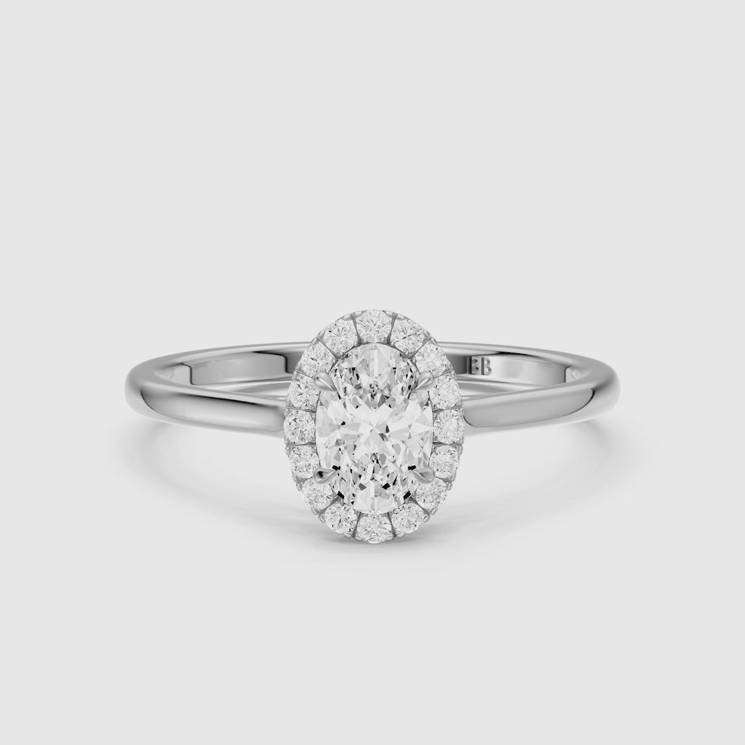 Load video: Amaris Oval Halo Cathedral Style Lab Grown Diamond Ring