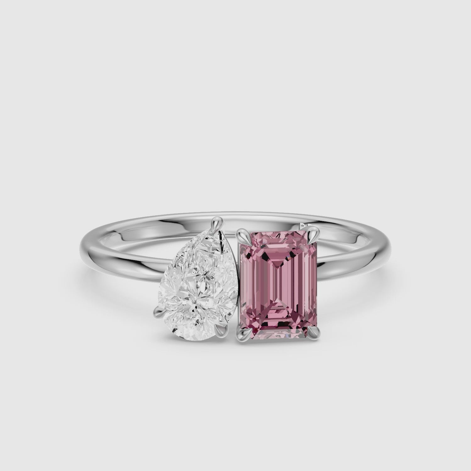 Load video: Kiara Pink Emerald Cut and Pear Shape Color Lab Grown Diamond Toi et Moi Ring
