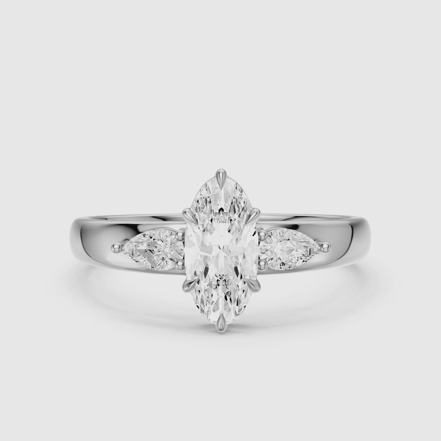 Load video: Celia Moval Moissanite Diamond Three Stone Ring with Pear Stones and Wide Tapered Band