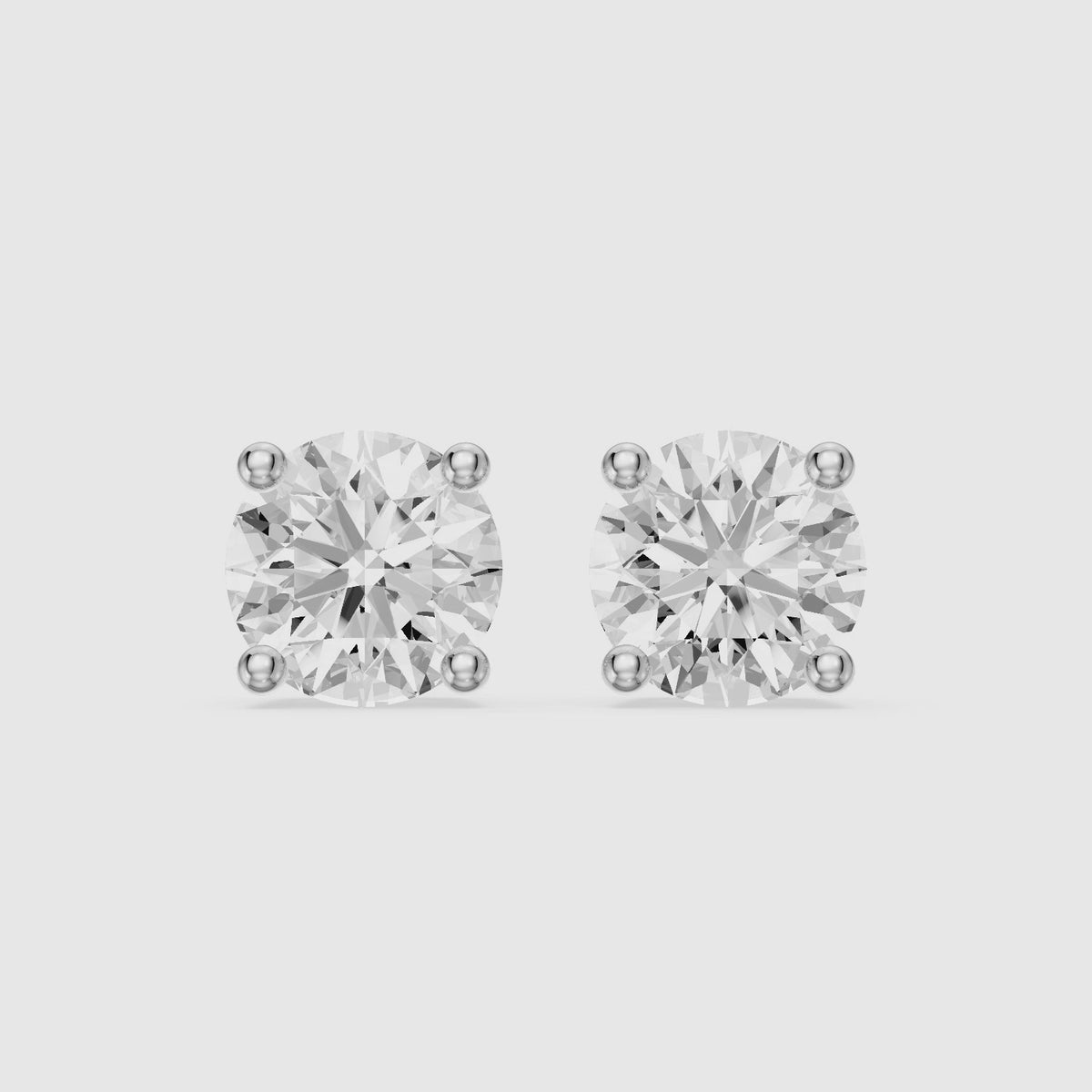 Load video: Liv Round Cut Lab Grown Diamond Solitaire Stud Earrings