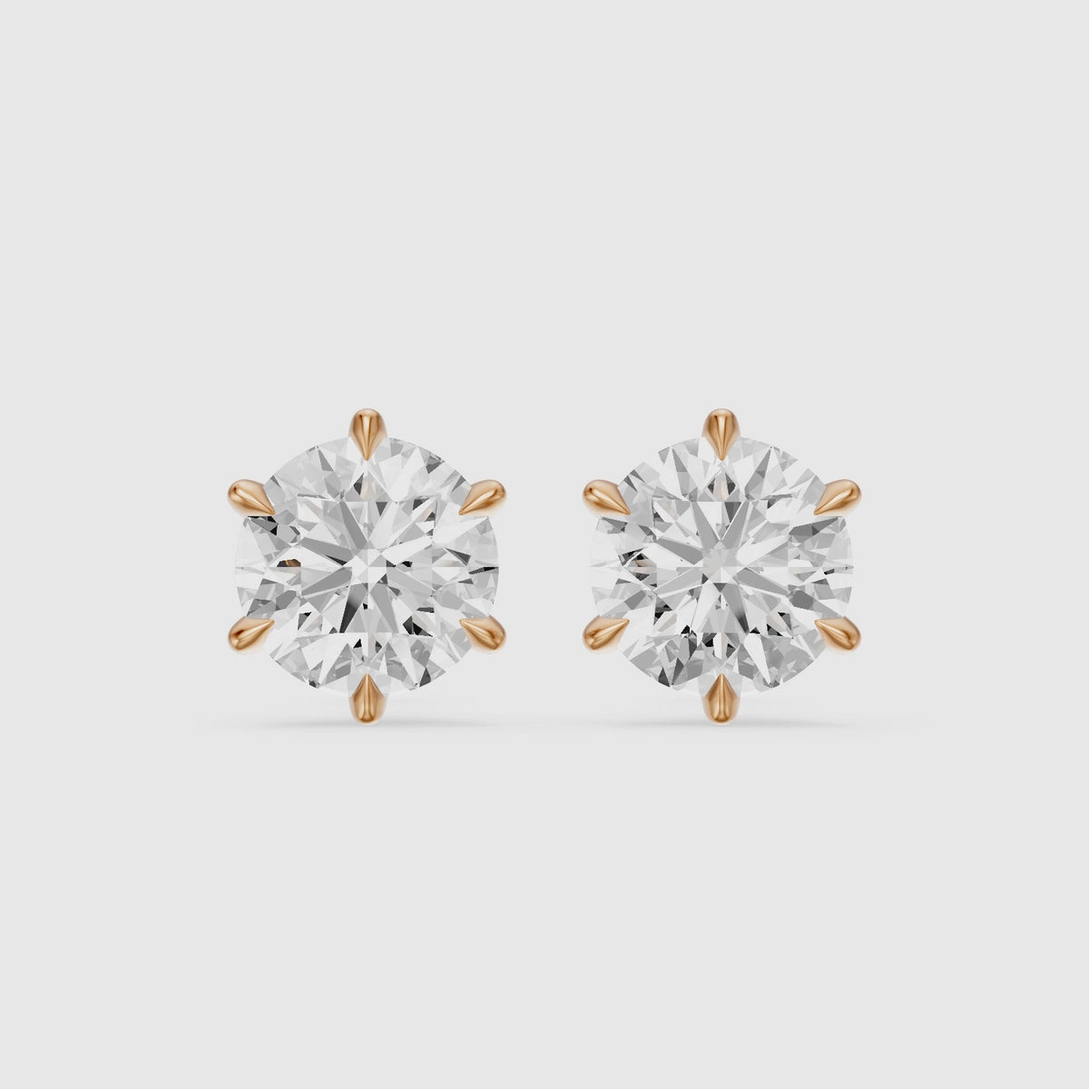 Load video: Valborg Six Prong Round Lab Grown Diamond Solitaire Stud Earrings