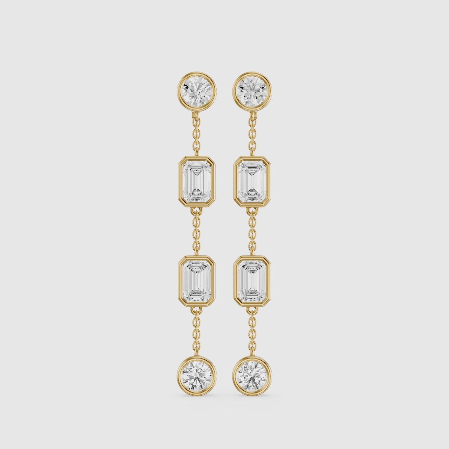 Load video: Quincy Bezel Set Emerald Cut and Round Lab Grown Diamond Station Drops Earrings