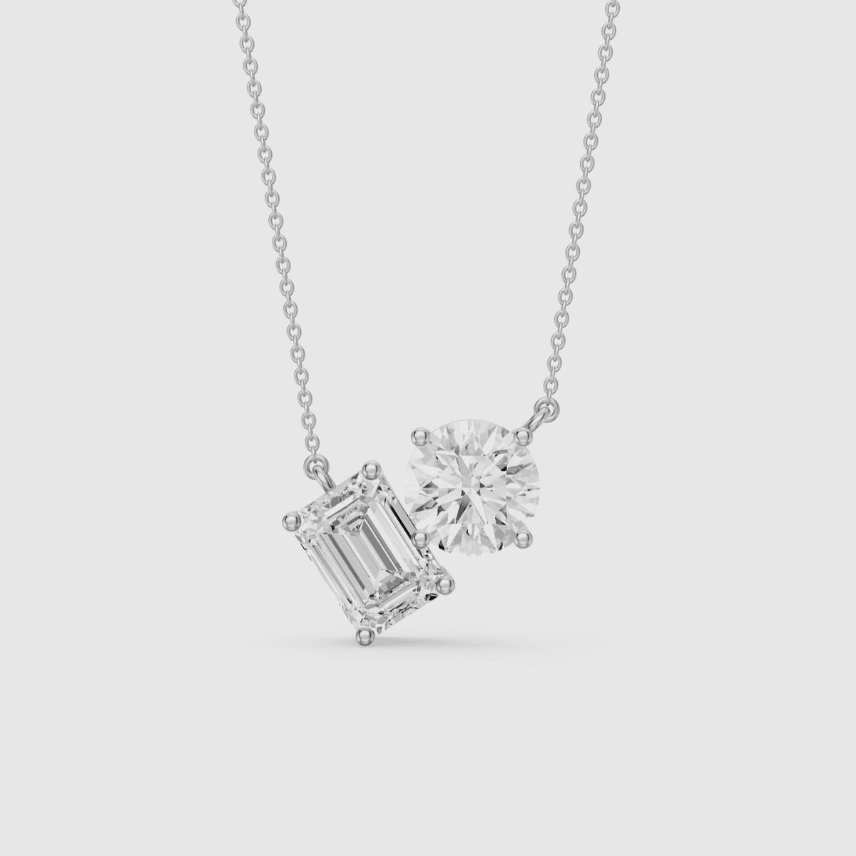 Load video: Navy Emerald and Round Lab Grown Diamond Toi Et Moi Pendant