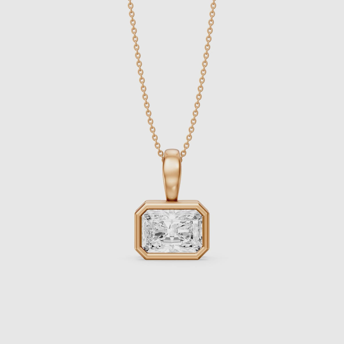 Load video: Maryam East West Radiant Cut Lab Grown Diamond Bezel Pendant