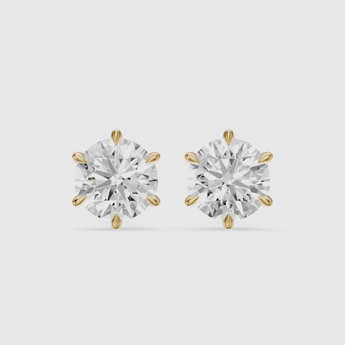 Load video: Valborg Six Prong Round Lab Grown Diamond Solitaire Stud Earrings