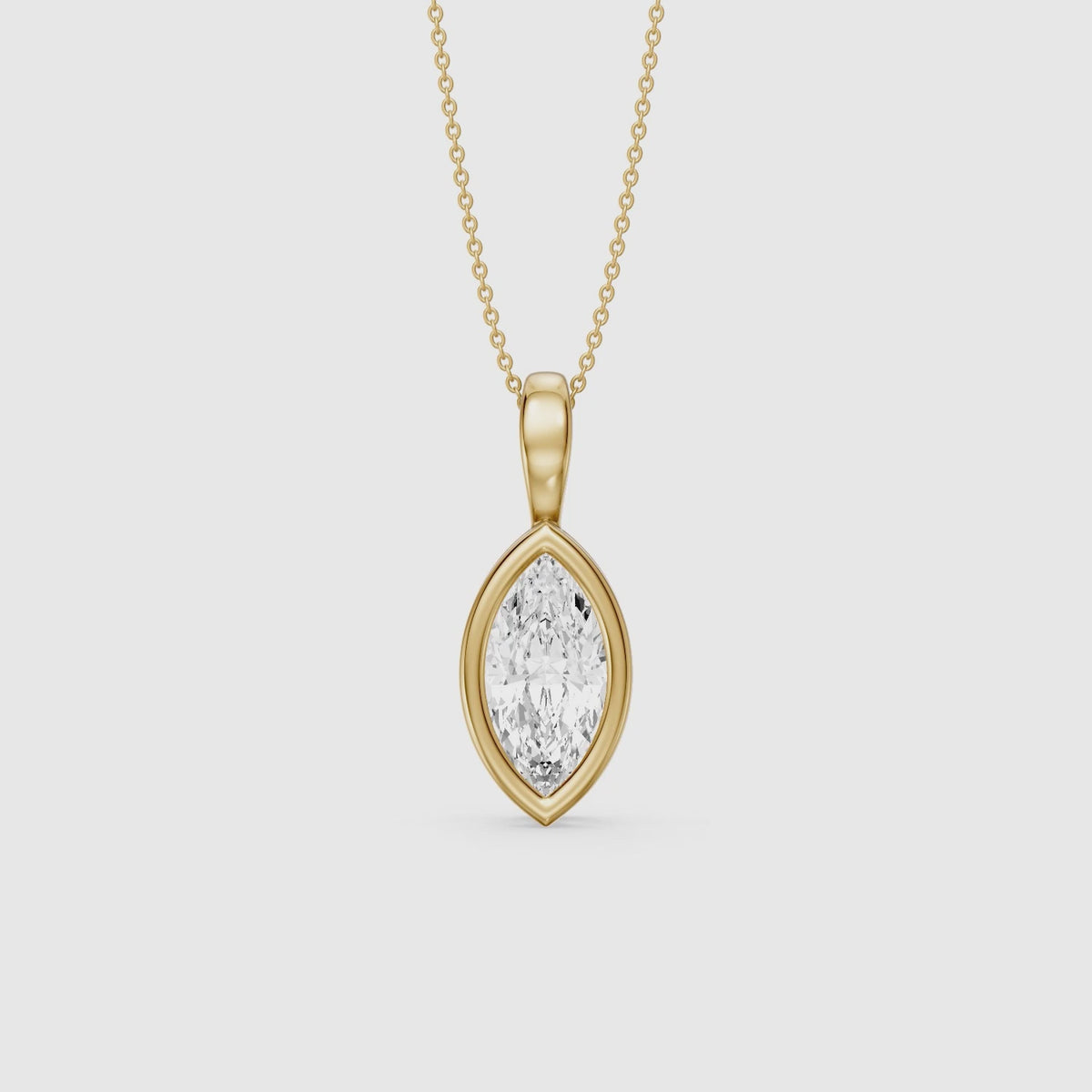 Load video: Diora Marquise Bezel Set Lab Grown Diamond Solitaire Pendant