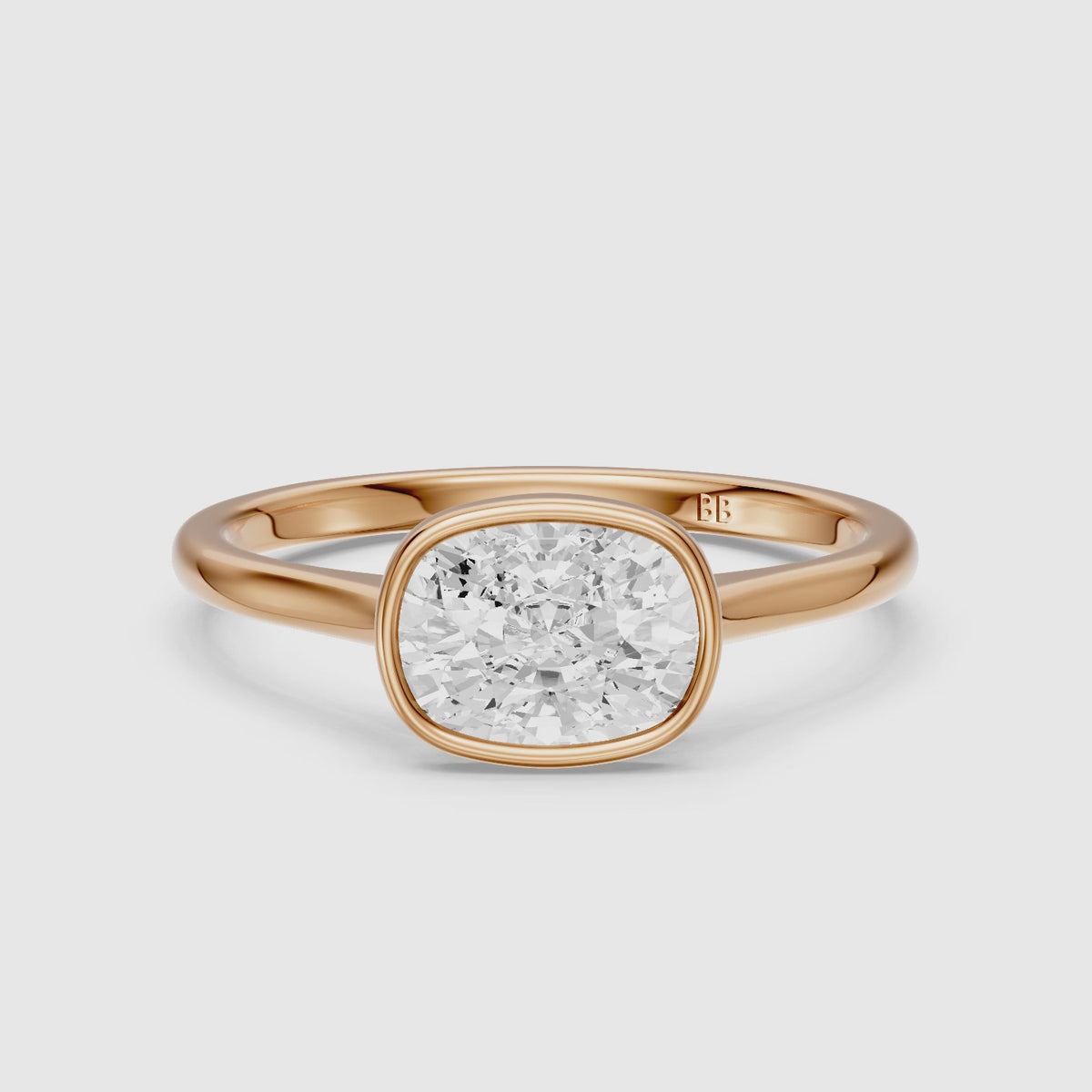 Load video: Yuna East West Cushion Lab Grown Diamond Bezel Set Solitaire Ring