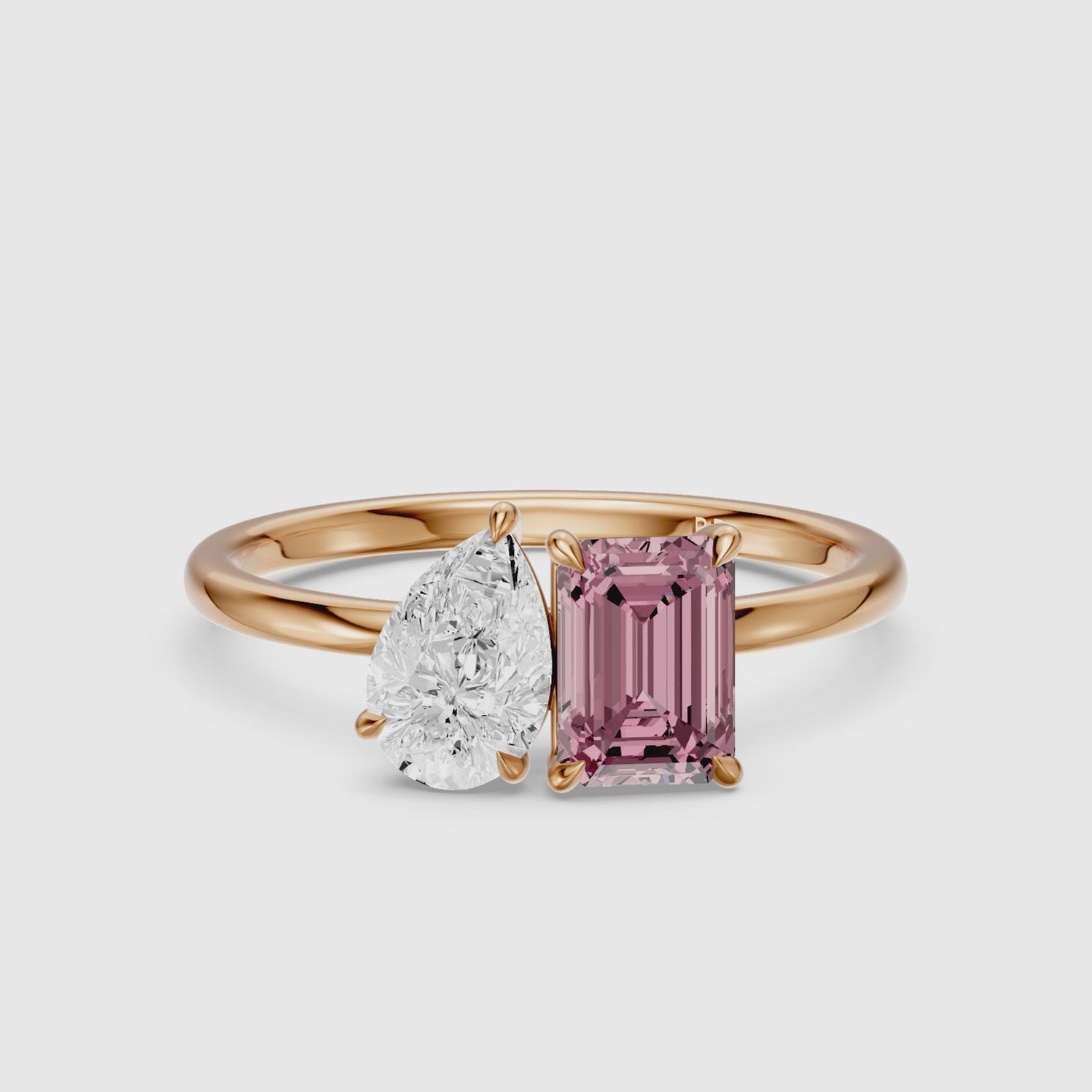 Load video: Kiara Pink Emerald Cut and Pear Shape Color Lab Grown Diamond Toi et Moi Ring