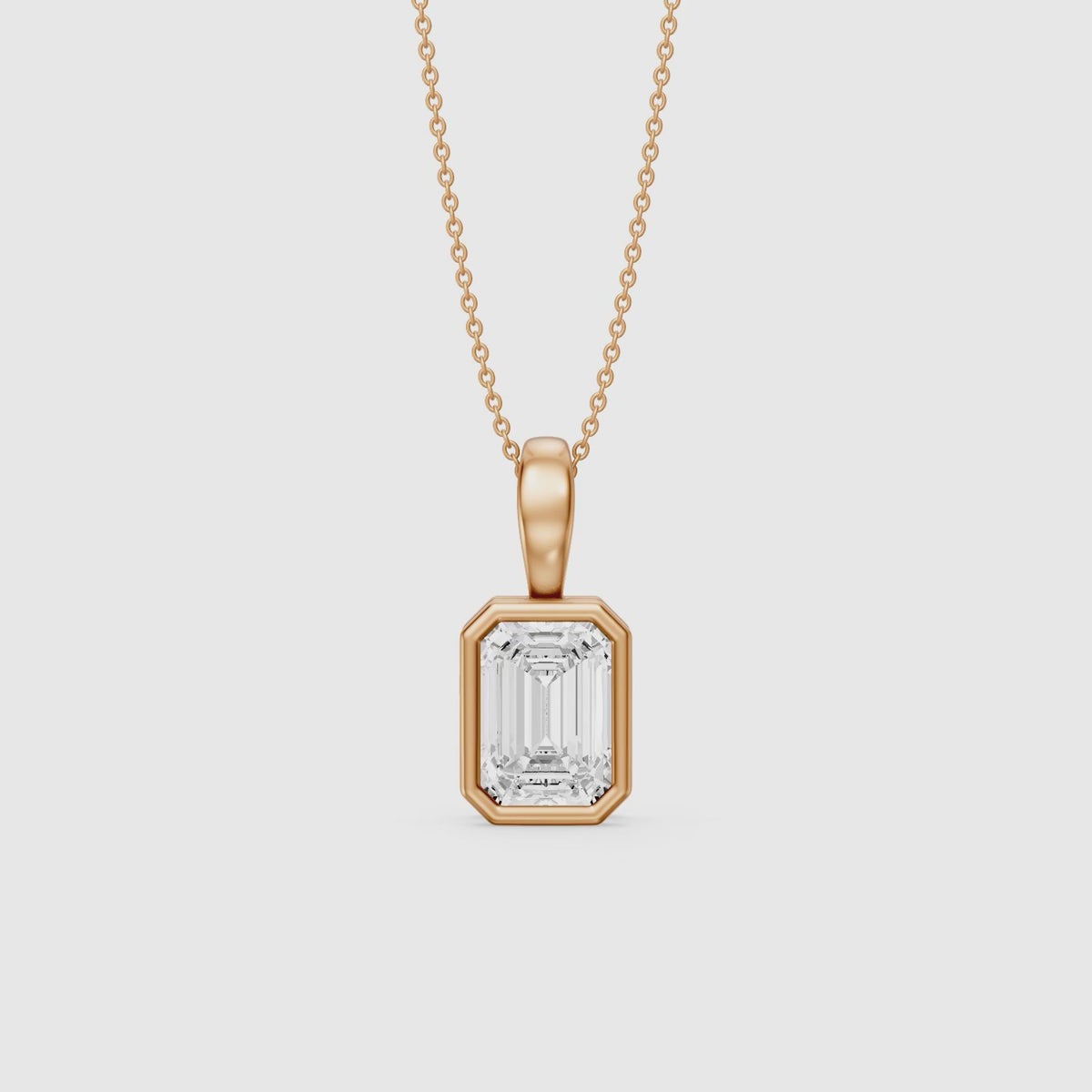 Load video: Lisa Emerald Bezel Set Lab Grown Diamond Solitaire Pendant