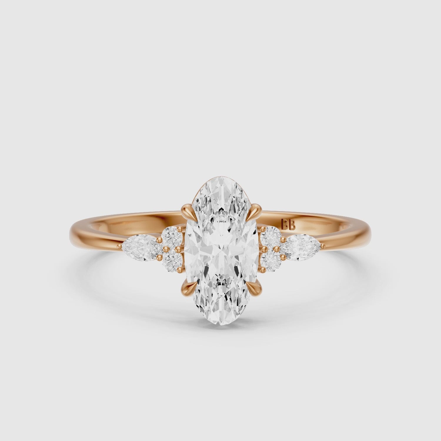 Load video: Estela Moval Moissanite Diamond Ring with Pear and Round Side Stones