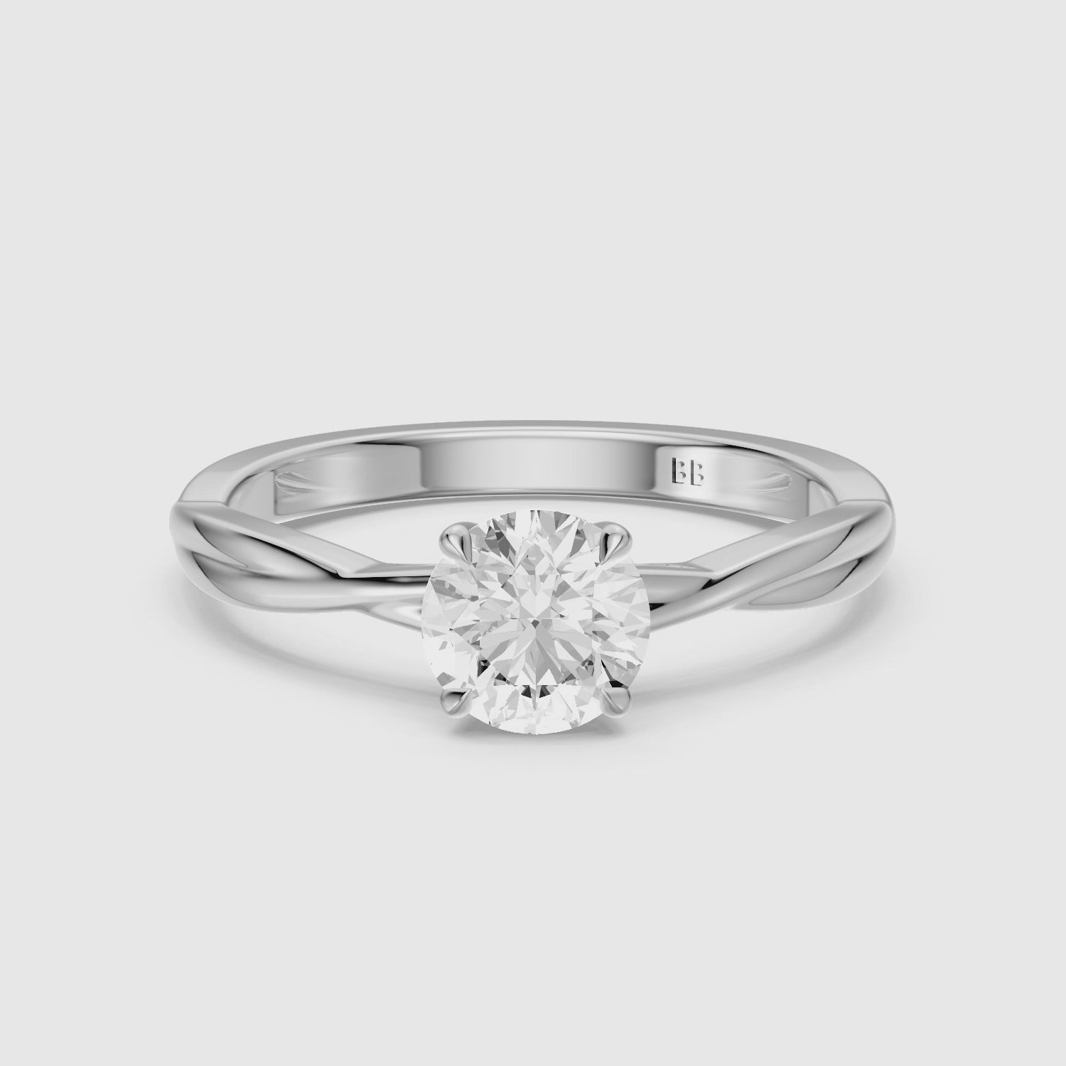 Load video: Selina Round Cut Solitaire Twisted Band Lab Grown Diamond Ring