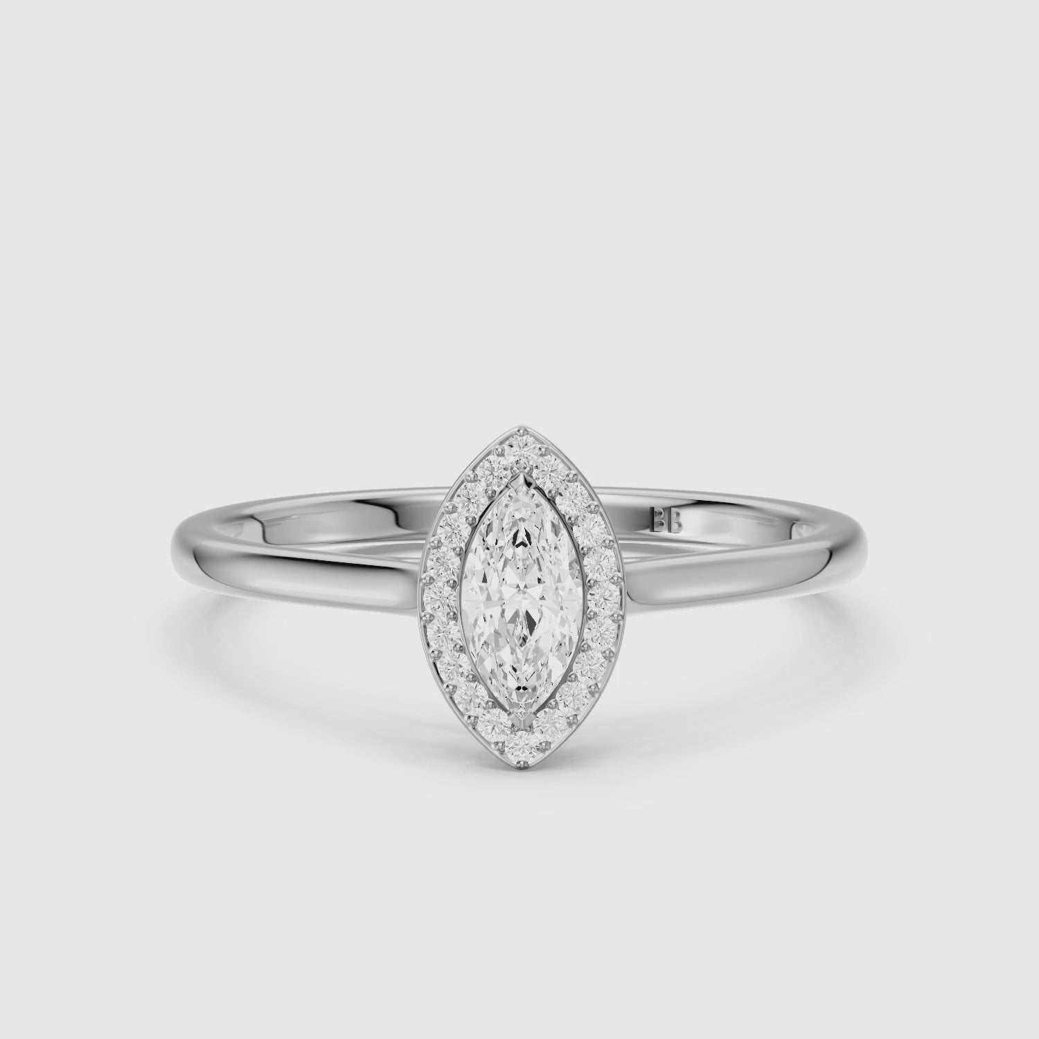 Load video: Evelyn Marquise Cut Halo Low Profile Lab Grown Diamond Ring