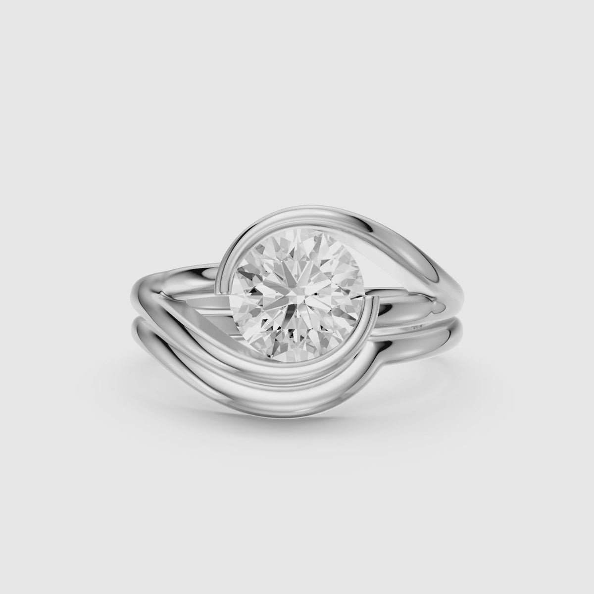 Load video: Elenice Round Lab Grown Diamond Bezel Set Split Shank Solitaire Bridal Set