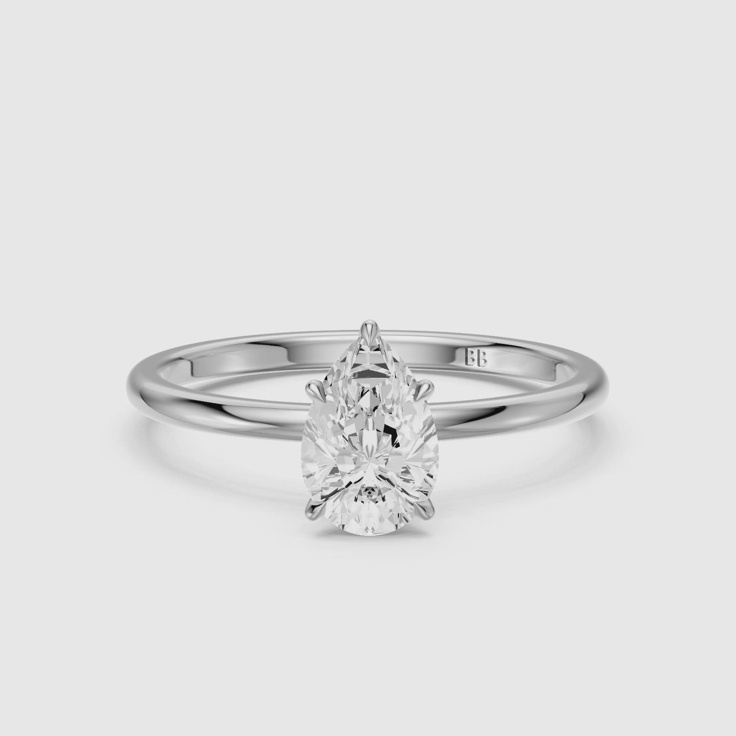 Load video: Jessica Pear Shape Hidden Halo Lab Grown Diamond Ring