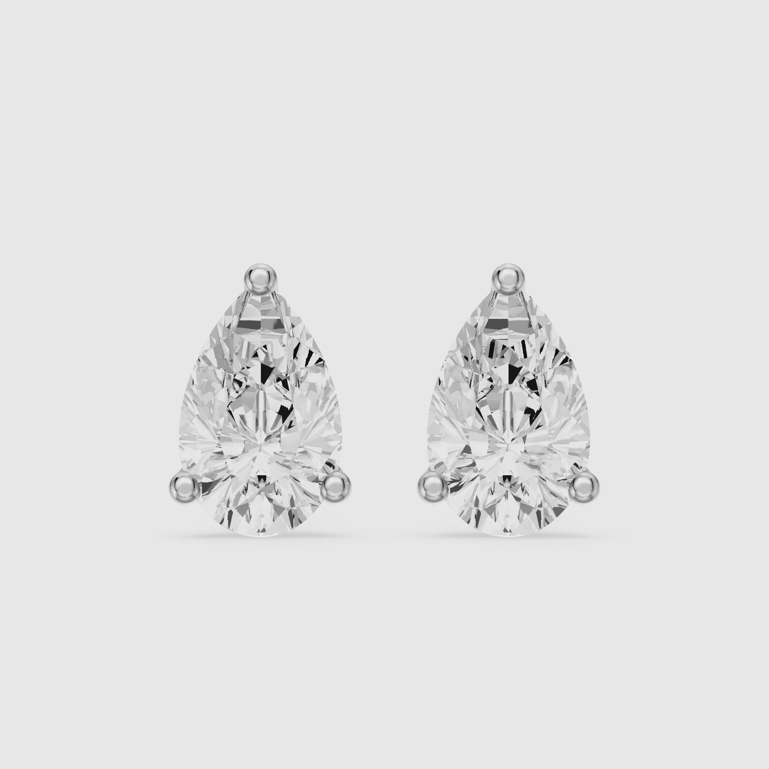 Load video: Saoirse Pear Cut Lab Grown Diamond Classic Basket Stud Earrings