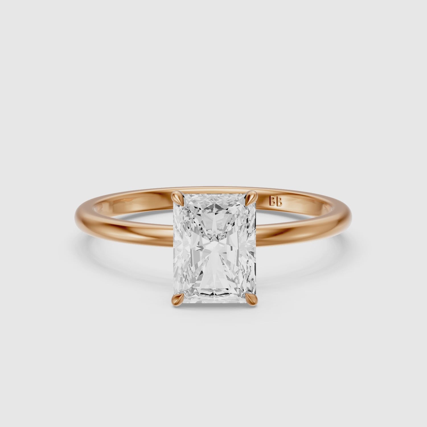 Load video: Clarie 4 Prong Radiant Cut Solitaire Moissanite Diamond Ring