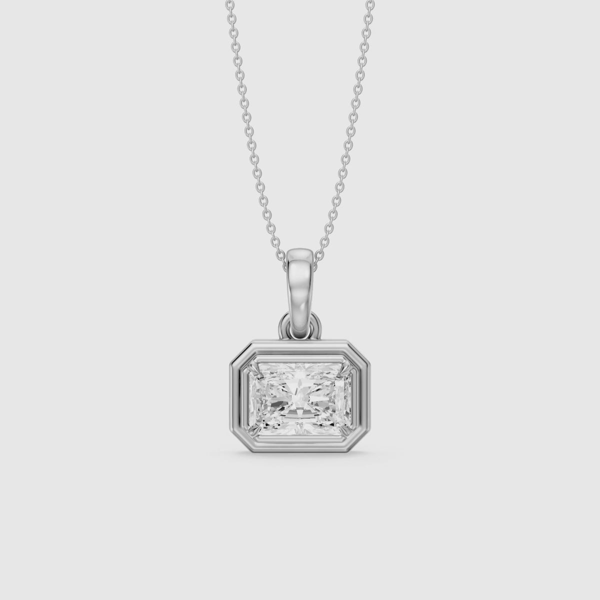 Load video: Aylin Modern Radiant Cut Lab Grown Diamond Bezel Pendant