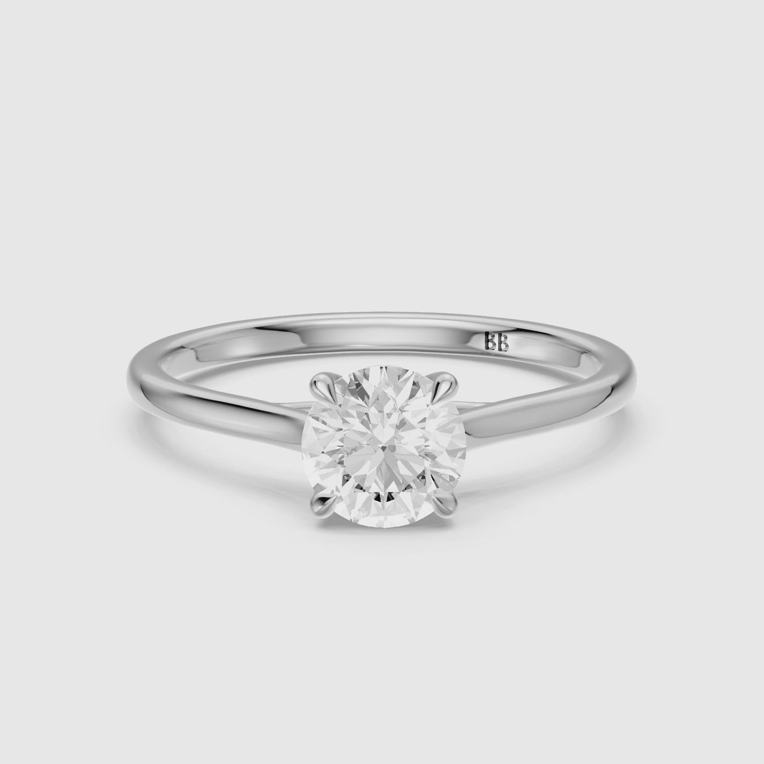 Load video: Reagan 4 Prong Round Cut Solitaire Lab Grown Diamond Ring