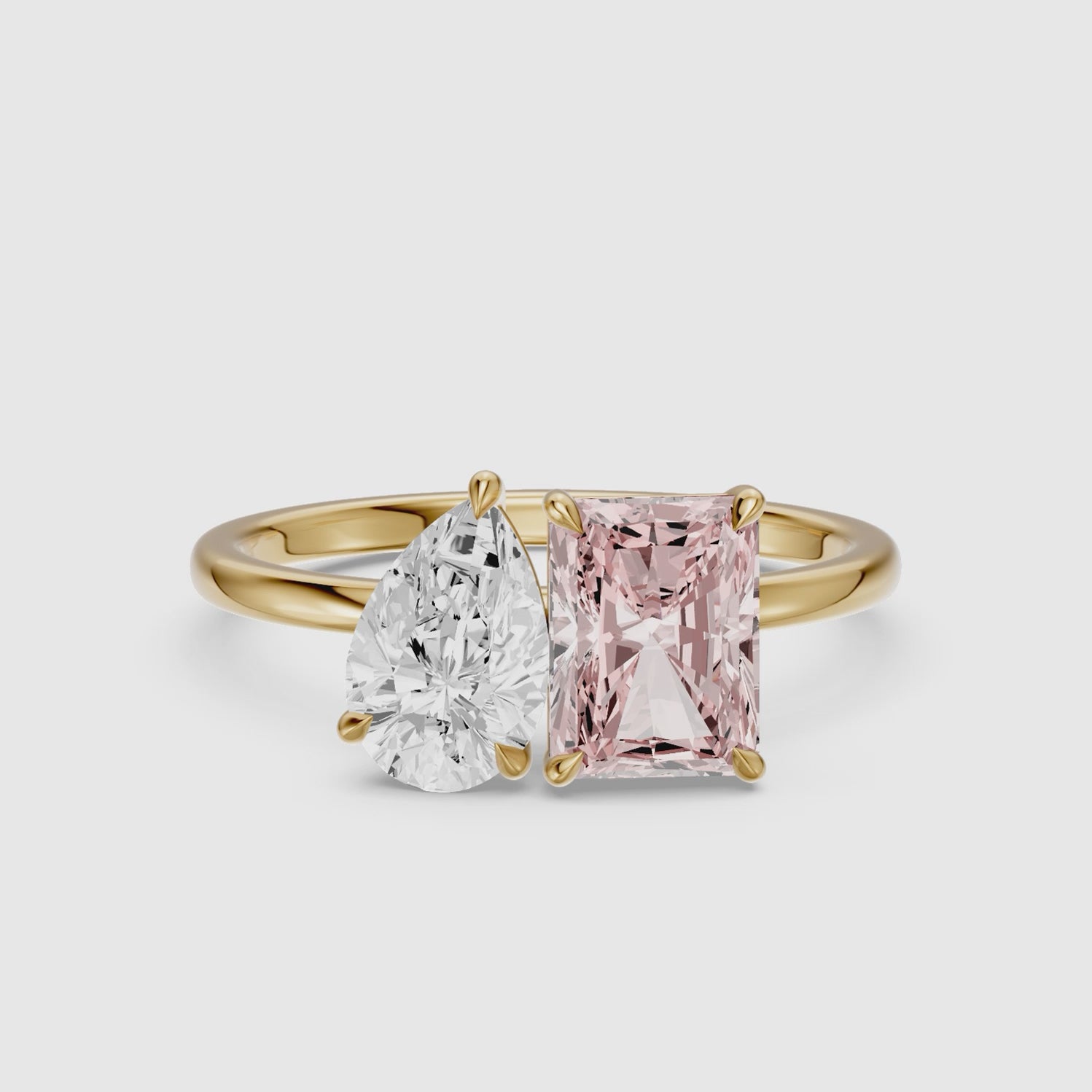 Load video: Liis Pink Radiant and Pear Cut Colored Lab Grown Diamond Toi et Moi Ring