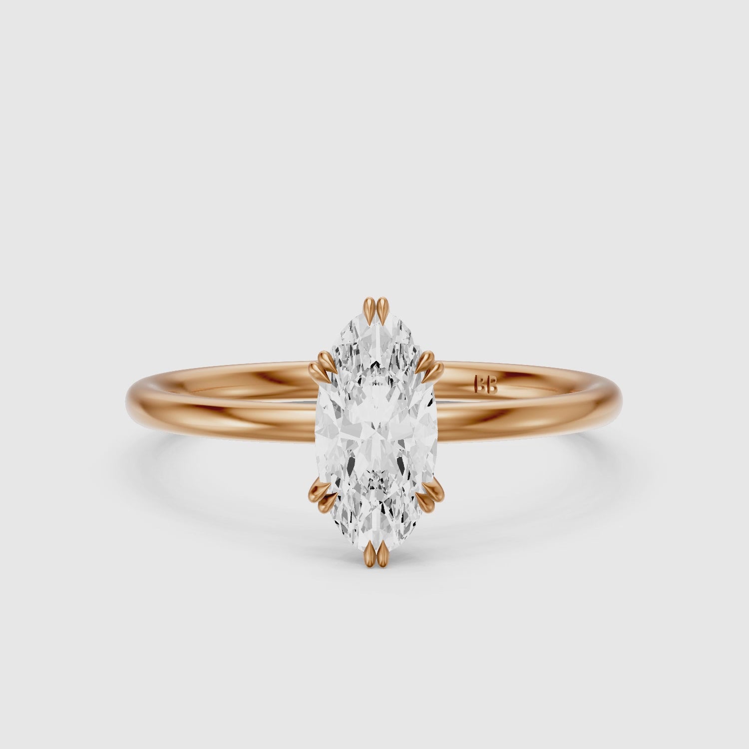 Load video: Juni Double Claw Prongs Moval Moissanite Diamond Solitaire Ring