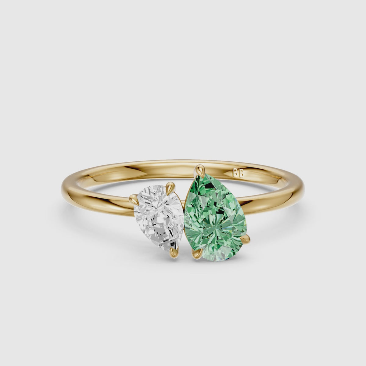 Load video: Irina Green and White Graduated Pear Shape Color Lab Grown Diamond Toi et Moi Ring