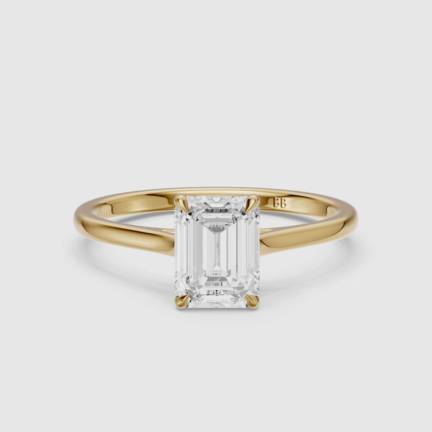 Load video: Emmali Emerald Cut Solitaire Cathedral Style Lab Grown Diamond Ring