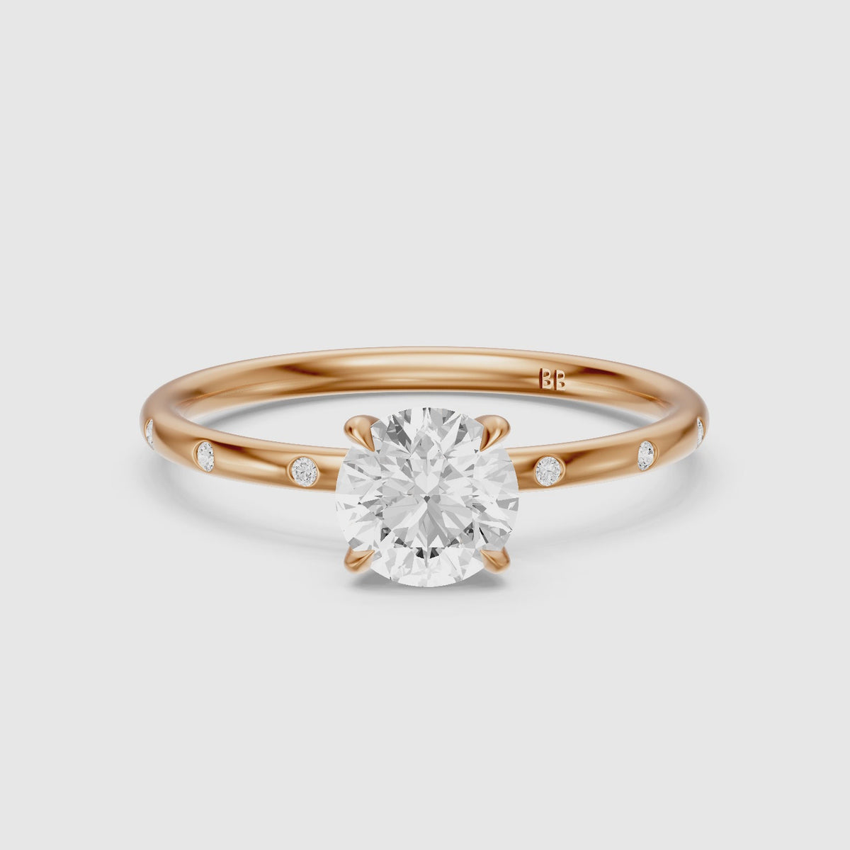 Load video: Calia Round Solitaire Lab Grown Diamond Engagement Ring with Flush Band