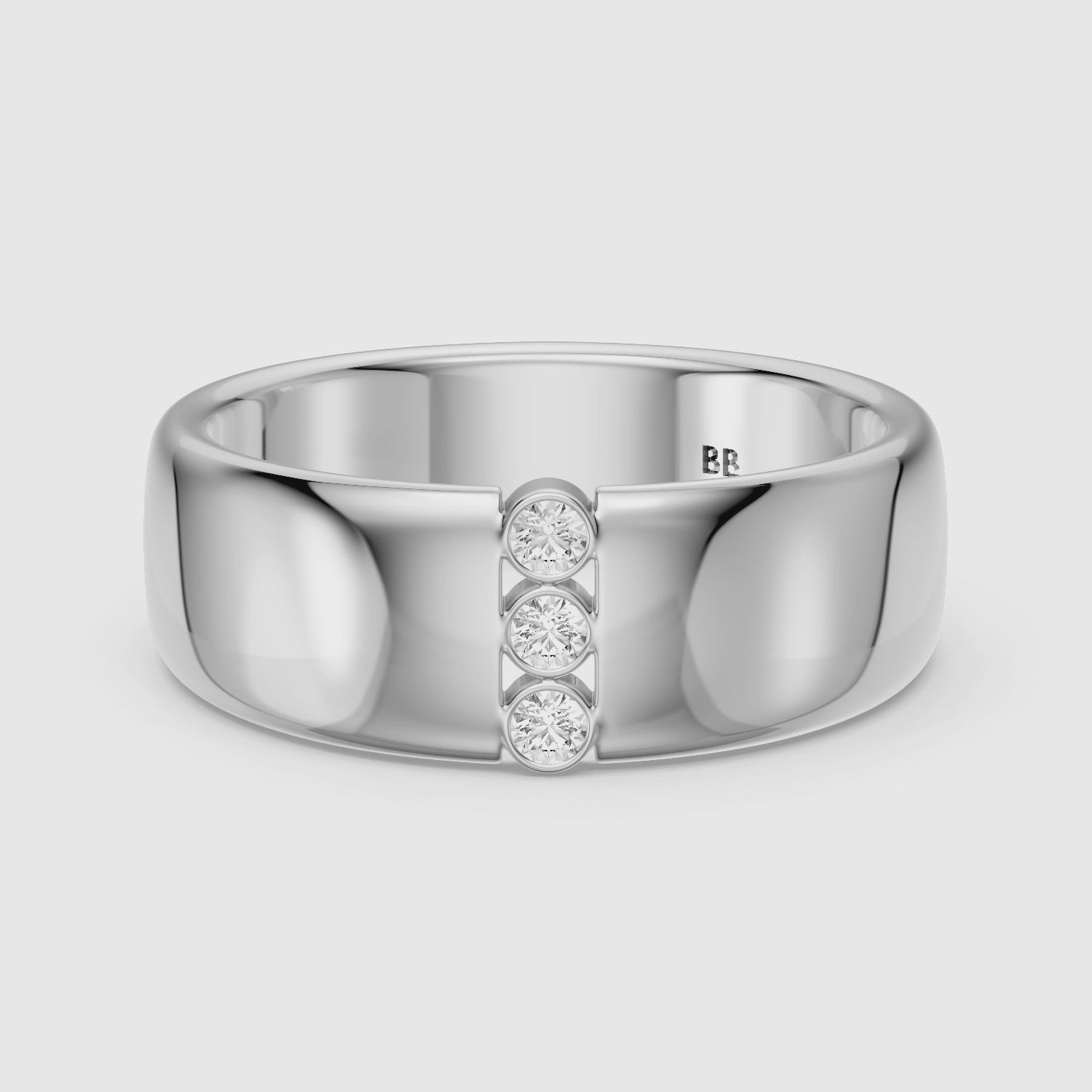 Load video: Chiara Round Cut Lab Diamond Bezel Set Three Stone Cigar Band